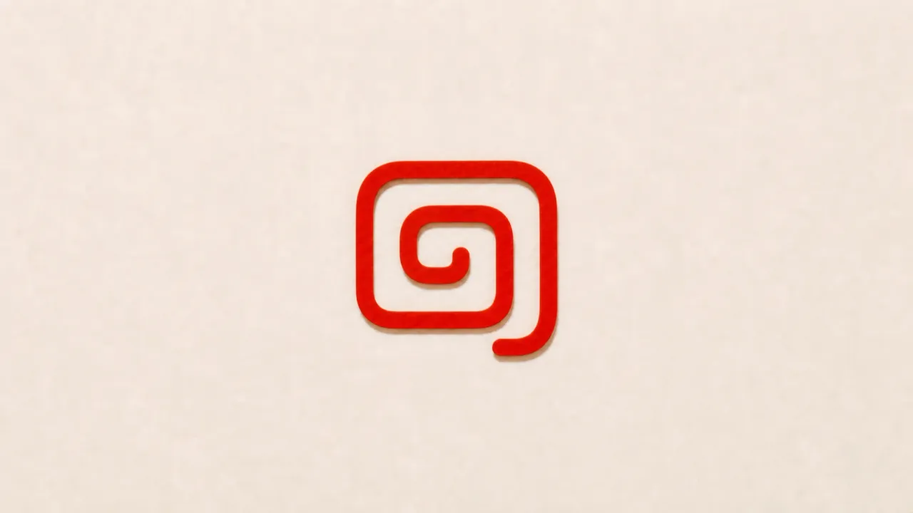 A red paper spiral coiling inward to a small centre on a pale paper background