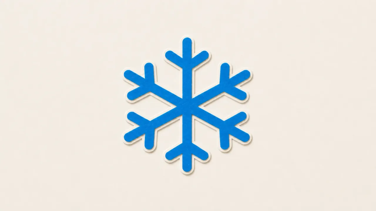 A blue paper snowflake cut from six chevrons around a small open diamond on a pale paper background